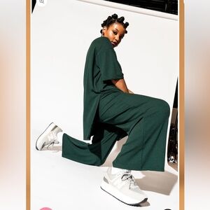 Dressed in Lala Lex ribbed playsuit in emerald